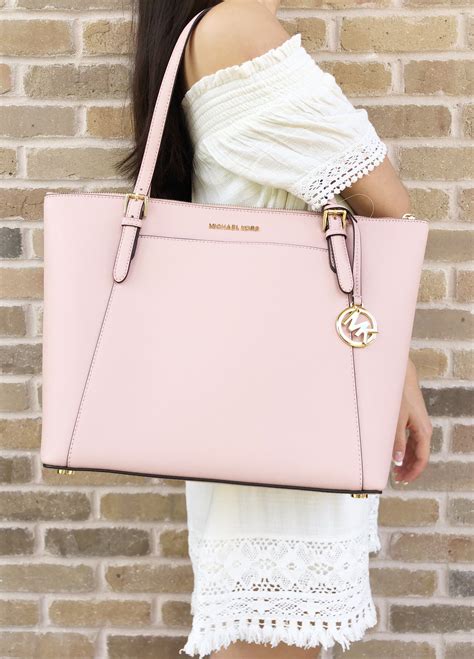 michael kors big pink purse|Michael Kors pink suitcase.